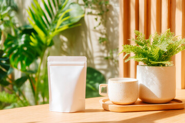 Minimal coffee setup with sugar packet and greenery
