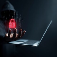 A hooded figure holds a glowing lock icon over a laptop