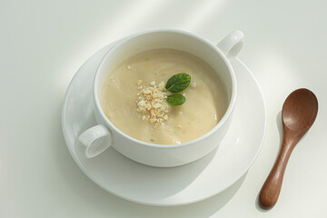 Cream of mushroom soup in a white ceramic bowl