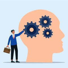 Businessman interacting with gears inside a human head. Concept of thinking process, problem solving, innovation, strategy and mental development