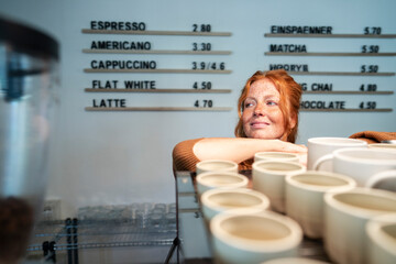Small business cafe owner with vision and motivation in coffee shop