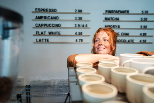 Small business cafe owner with vision and motivation in coffee shop