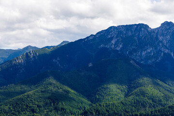 Majestic mountain range with clouds