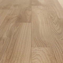 Naklejka premium The text describes a light oak wood grain texture with a clean polish.