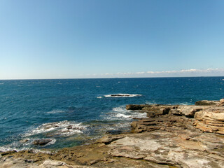 Rocky Seashore of Senjojiki under Clear Blue Sky, Japan