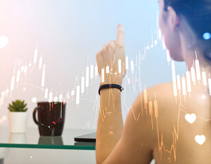 Woman Analyzing Stock Market Data with Candlestick Chart Overlay at Home