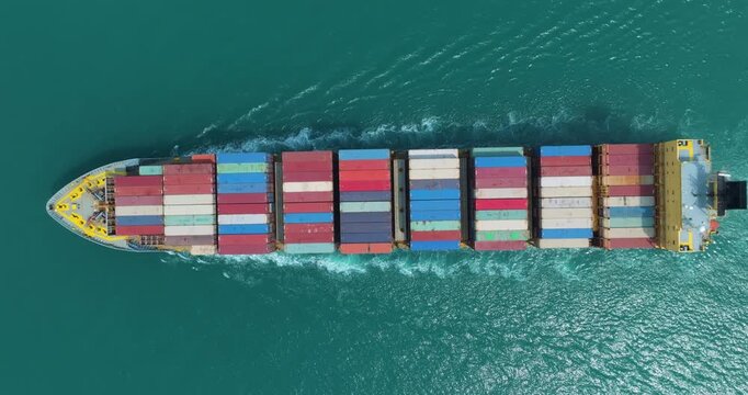 shipping logistic, cargo container ship sailing in sea to import export goods and distributing products to dealer and consumers across worldwide, by container ship Transport business service.4k video