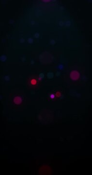 Defocused lights moving. Loop. 4K Vertical