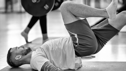 Physical rehabilitation exercises with a ball in the gymnasium