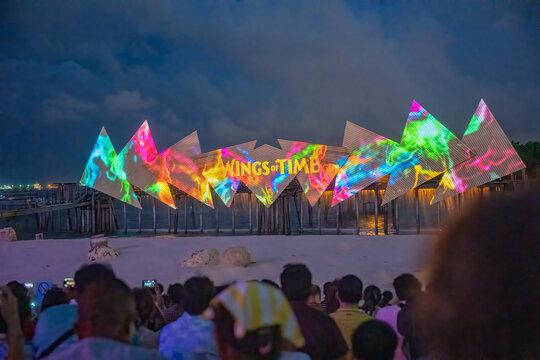 Singapore - August 19, 2023: Laser, light, water and sound show. Wings of time performed on the beach in Sentosa