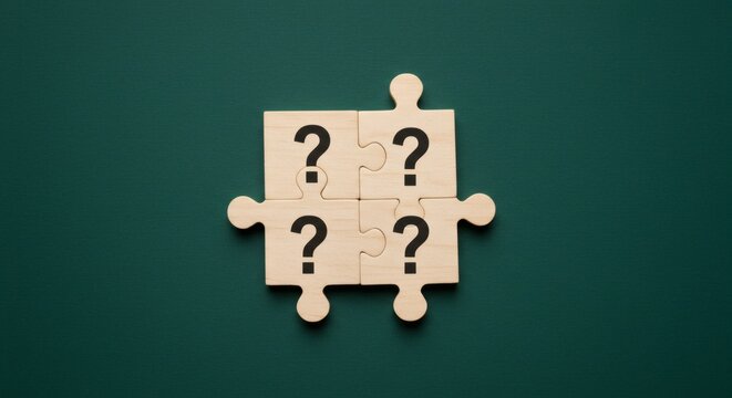 Puzzle Quest Four Interlocking Pieces Forming a Question Mark on Green.