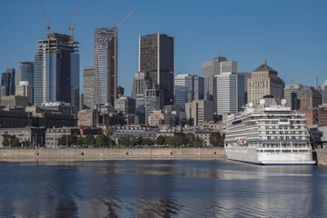 All inclusive luxury yacht cruiseship cruise ship liner Star docked in port St. Lawrence River in Montreal, Quebec Canada during New England Indian Summer cruising