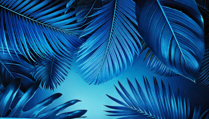 Vibrant blue tropical leaves arranged as a frame
