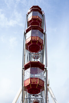 ferris wheel against blue sky