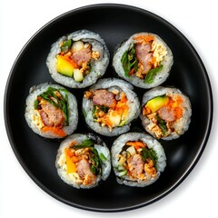 Sushi on a black plate, top view