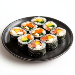 Sushi on a black plate, top view