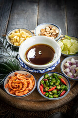 Traditional Thai Snack Miang Kham with Ingredients.