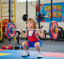 Child lifting weights