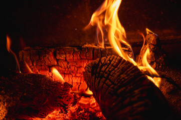 Abstract background of hot burning charcoal and fire flames. Concept of heat, energy, and the power of nature
