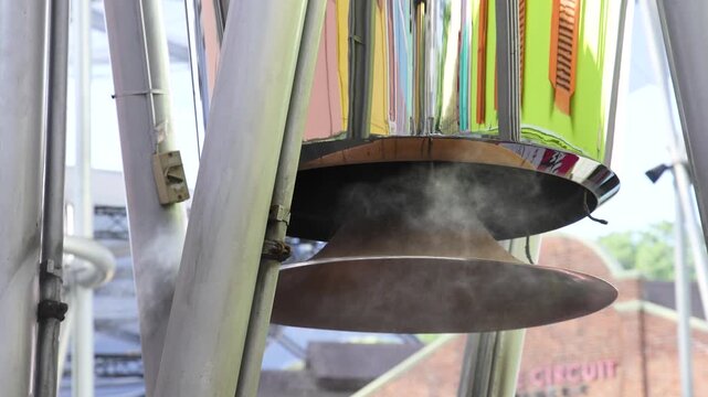 Steam Emitting from Urban Building Vent in Singapore