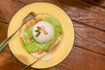 Delicious Dessert with Ice Cream and Green Sauce