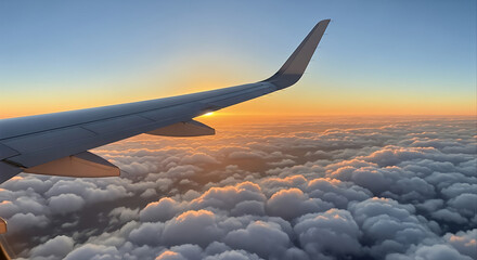 Obraz premium Airplane Wing and Sunset Cloudscape Above.