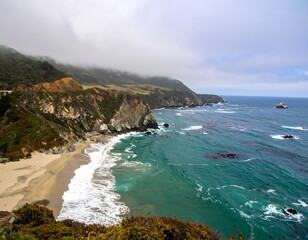 Coastal landscape with dramatic cliffs and beach