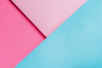Abstract geometric background with overlapping pastel pink and blue textured paper sheets forming diagonal lines