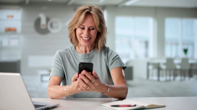 Woman Testing Glucose Level With Continuous Glucose Monitor