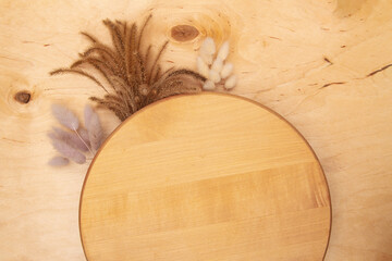 Fluffy decorative spikelets on wooden background with copy space. Greeting card with Serenity captured on wooden canvas.