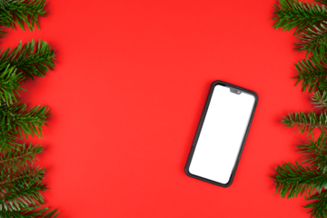 red christmas copy space background with fir tree twig frame and mobile phone with blank display isolated on white or transparent png