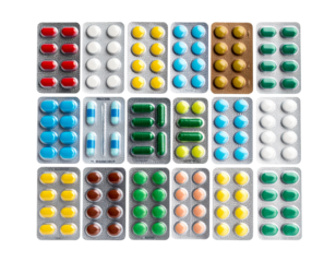 Assorted Colorful Pill Blister Packs Arranged in Grid Pattern, Top View, isolated transparent background png