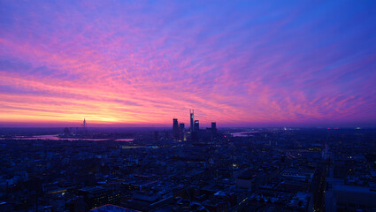 Lush Pink and Purple Sunset Over a European Cityscape