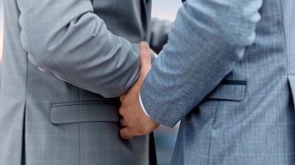 Handshake in professional suit jacket signifies agreement, partnership, and collaboration with contract deal under warm sunlight and blurred city background for successful business interaction