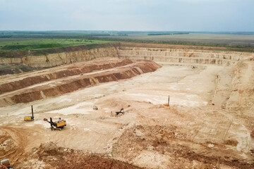 quarry for the extraction of sand and gravel, a view from the he