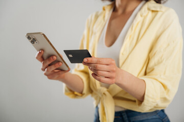Close up view of woman that is in the studio against background