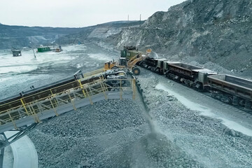 pouring of the finished fraction of crushed stone after crushing