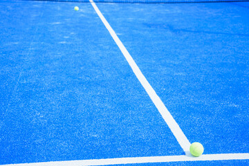The background texture of a blue padel court floor sports venue concept