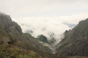 Naklejka premium mountain landscape with clouds