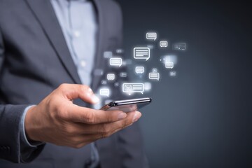 Businessman using a smartphone and chat message on the screen concept