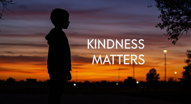 Kindness matters as a child stands silhouetted against a vibrant sunset, National Stop Bullying Day concept