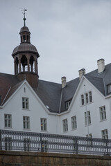 A partial view of a historic building, identified as Prinzen Palas, in Pl&ouml;n, Germany