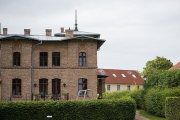 the old house, The photo captures the rustic charm and historical detail of the building, with a...