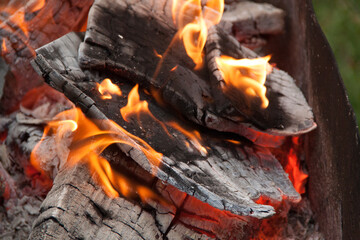 Fire in the grill. Fire in the fireplace. Fire and coals. design