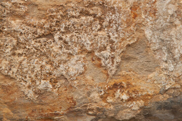 Photo of an old wall. Old wall cracked plaster. Old destroyed wall. Background of old plaster