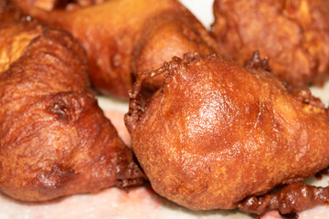 Close up of homemade chicken balls in batter fried and golden