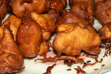 Close up of homemade chicken balls in batter fried and golden