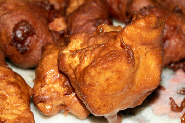 Close up of homemade chicken balls in batter fried and golden
