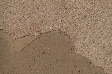 Photo of an old wall. Old wall cracked plaster. Old destroyed wall. Background of old plaster