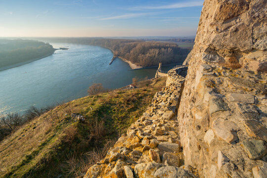 Aerial view of the ancient Devin Castle ruins standing guard over the Danube River, its weathered stones a testament to time, Devin, Bratislava Region, Slovakia.